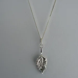 Dangling leaves pendant with sapphire dew drop